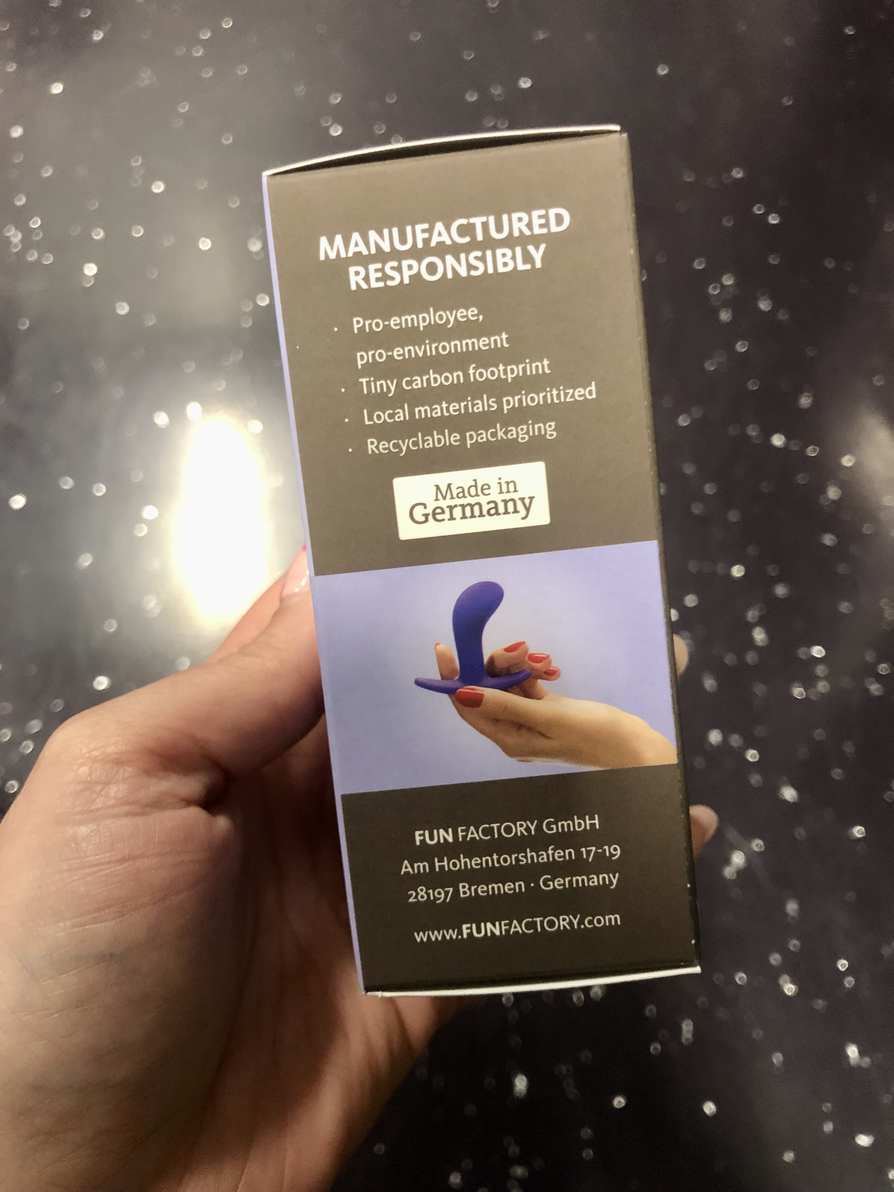 Hand Holding a Product Box