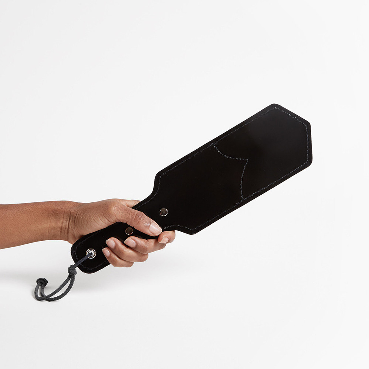 Patent Leather Pocket Slapper held in hand