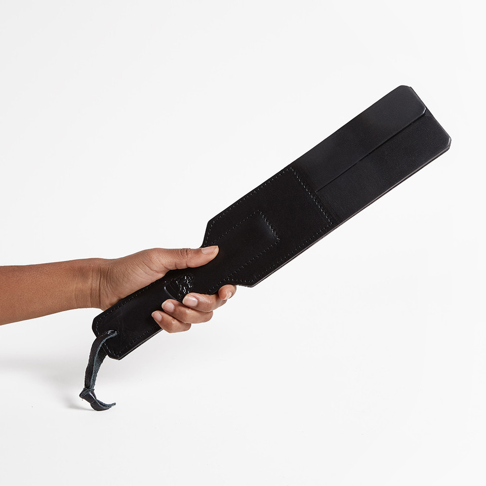 Leather Slapper held in hand