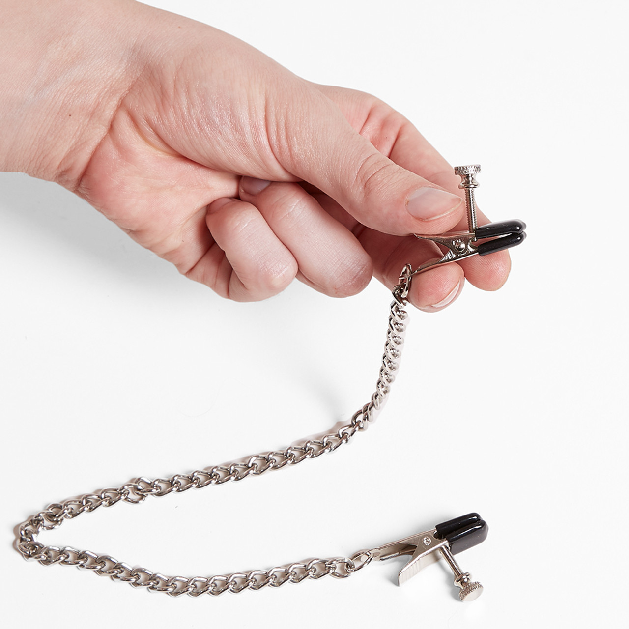 Broad Tip Adjustable Nipple Clamps held in hand