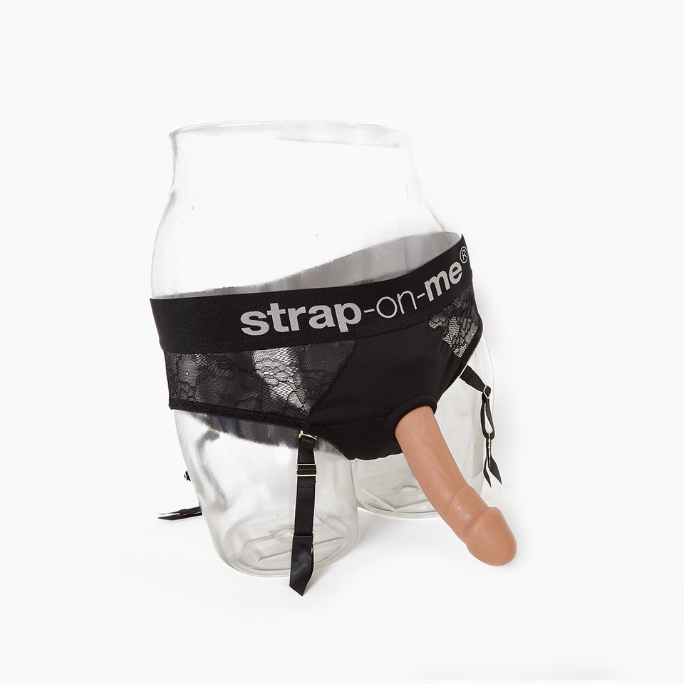 Strap On Me Diva Underwear Lingerie Harness on mannequin holding strap on dildo