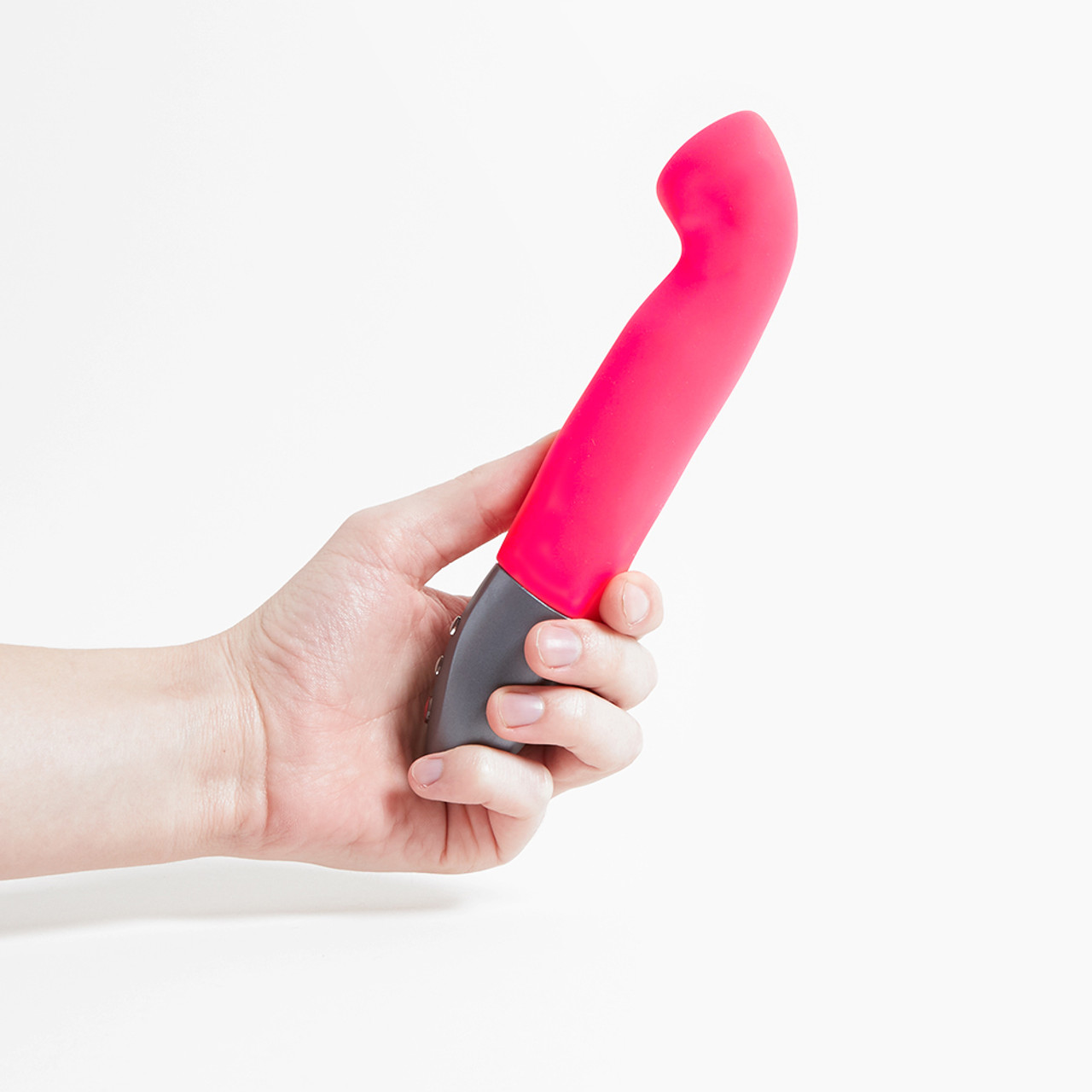 Fun Factory Stronic G in hot pink held in hand