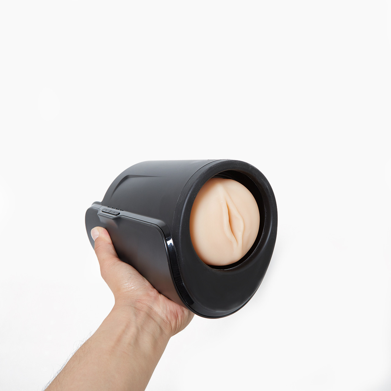 Kiiroo Keon and Feel Male Stroker Combo held in hand