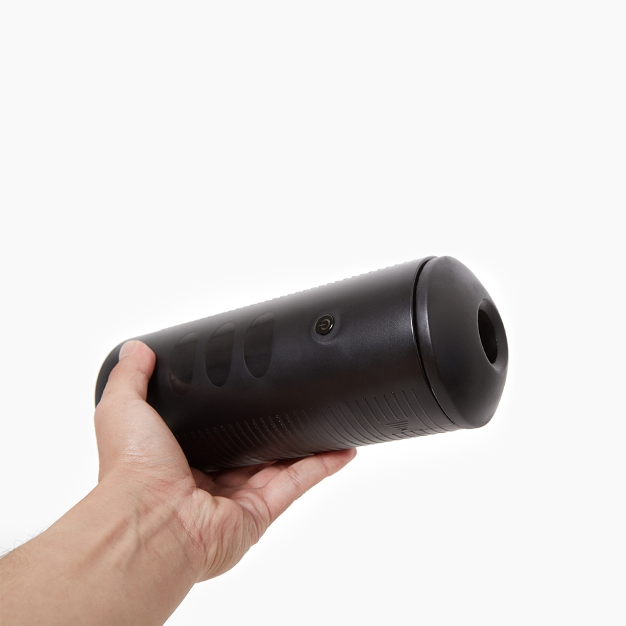 Kiiroo Titan interactive stroker held in hand