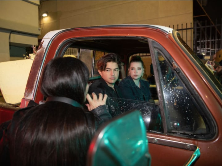 Al Ortega and Abigail Breslin being directed by Kim Hopkins BTS filming 'The cannibals' TV Show