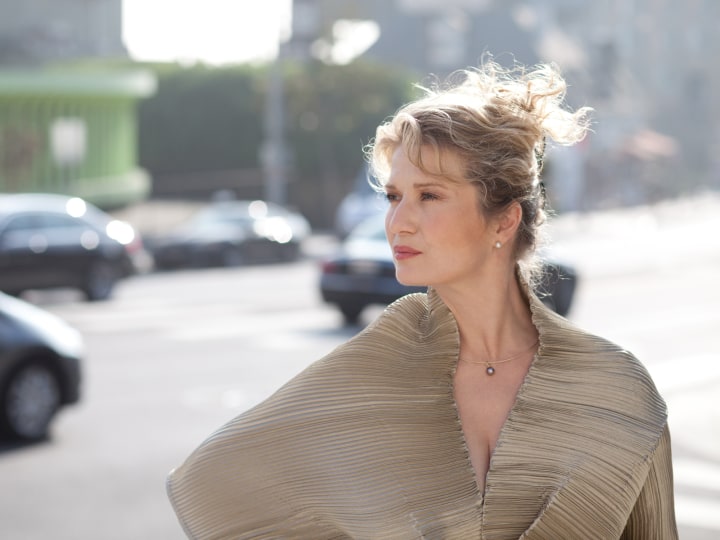 Tell Me Again, Please, Why Have We Come To This Desolate Place And How Long Must We Stay?