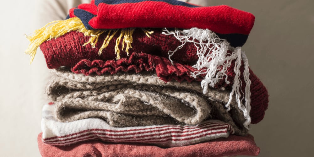 Wear several layers of synthetic clothes in cold weather