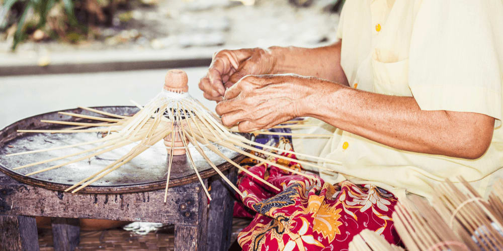 The making of an umbrella with wooden ribs