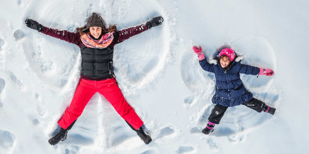 Make snow angels with your children.