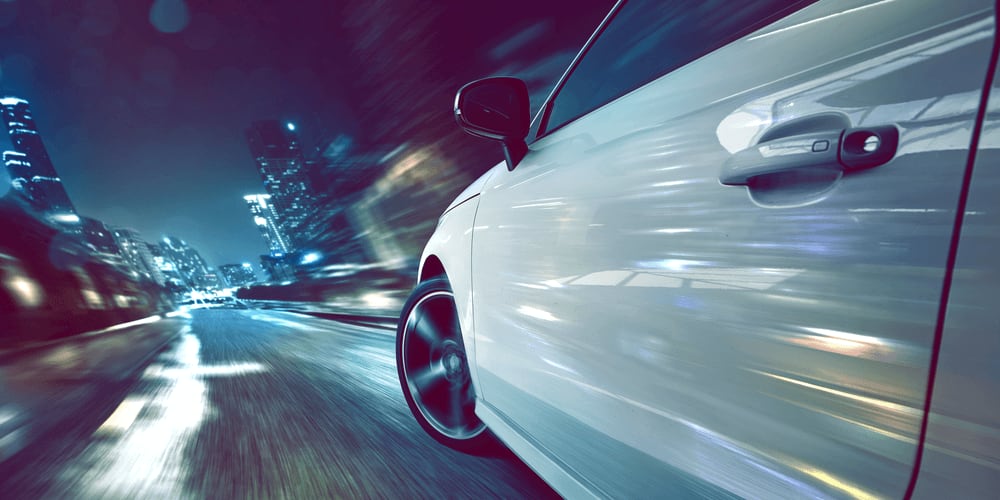 very fast car driving at increadibly high speed
