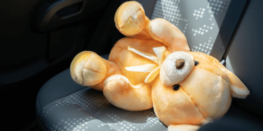 Leave a stuffed toy near you when you're driving with a child in the back