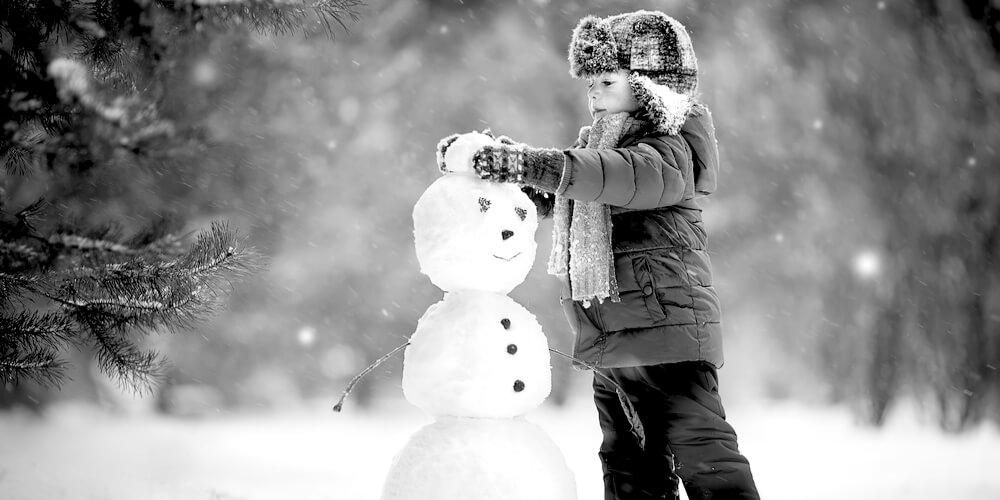 Boy with a snowman