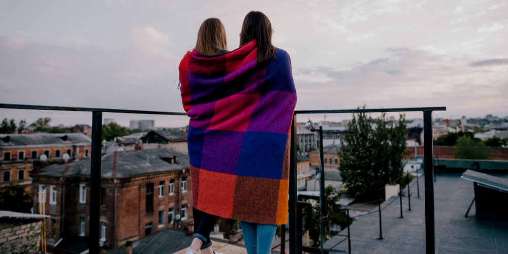 Two girls in a blanket