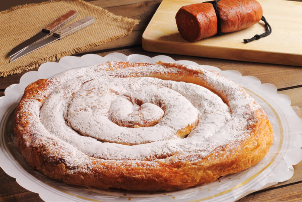 Ensaimada pastry and sobrasada sausage are two traditional dishes one must try in Mallorca.