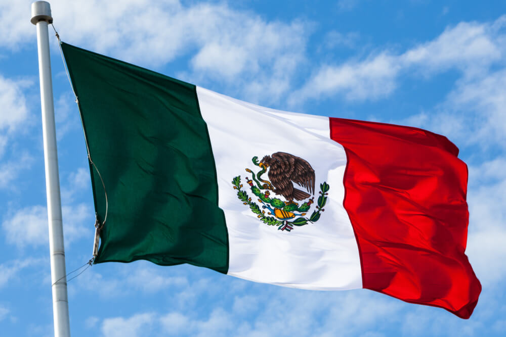 Mexican flag is a tricolor with a coat of arms in the center.