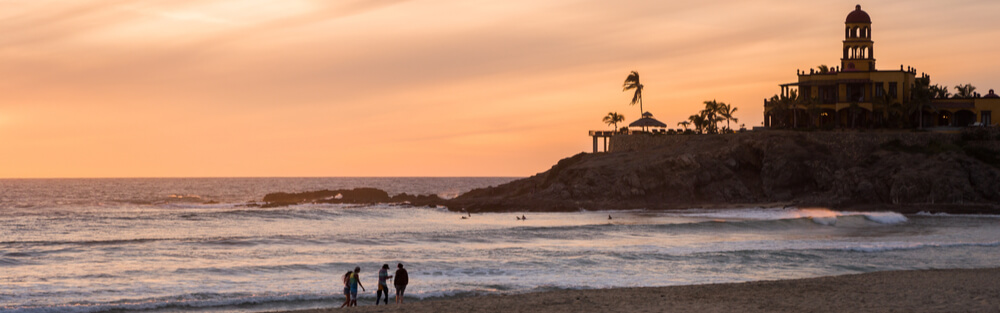 Vast beach at sunset in Todos Santos, Mexico