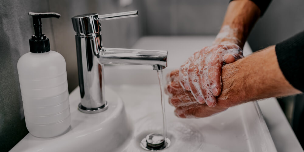 Man washing his hands