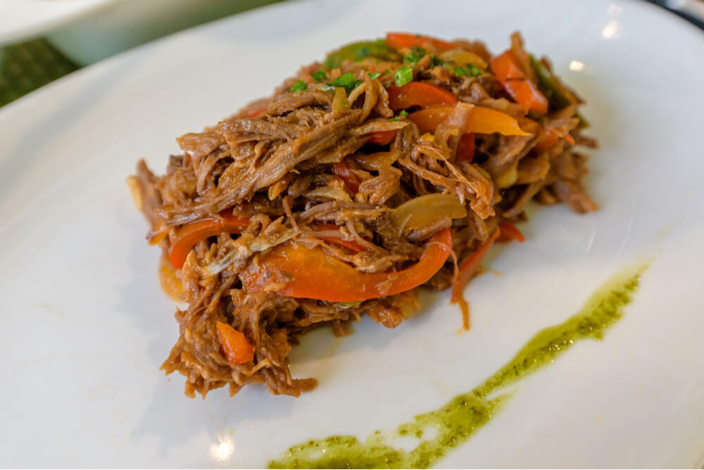 Ropa vieja, traditional Cuban national dish made of shredded beef and vegetables
