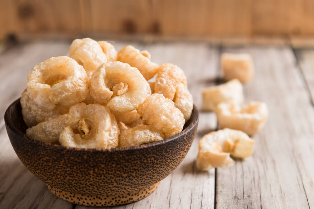 Pork rinds also known as chicharon or chicharrones, deep fried pork skin