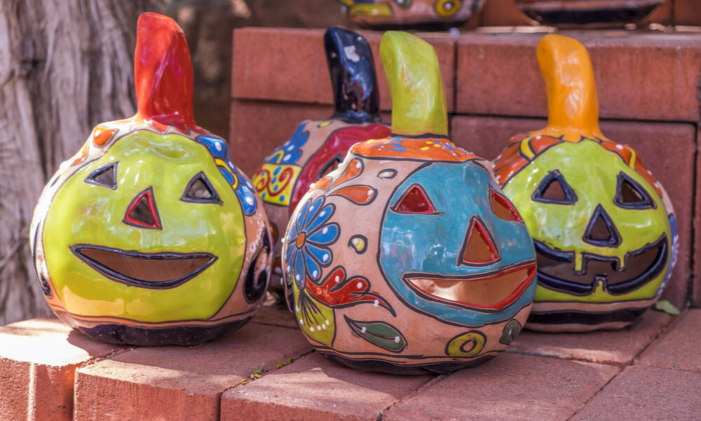 Talavera jack-o'-lanterns will give a folk feel to your Halloween décor