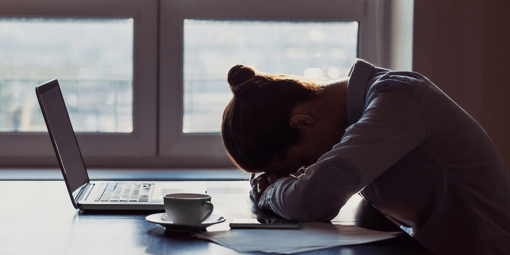 Tired woman at work