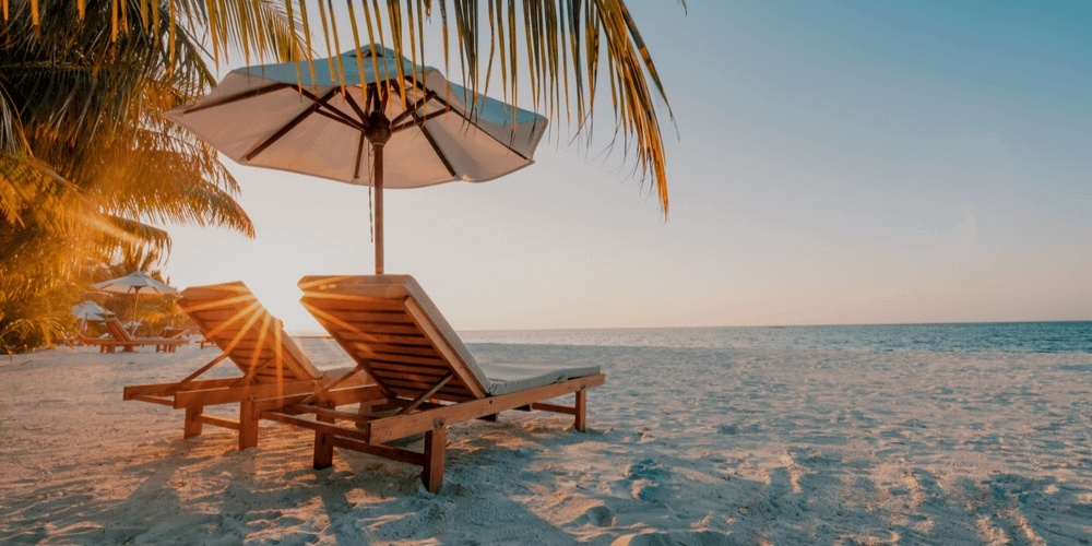 Two beach chairs by the sea