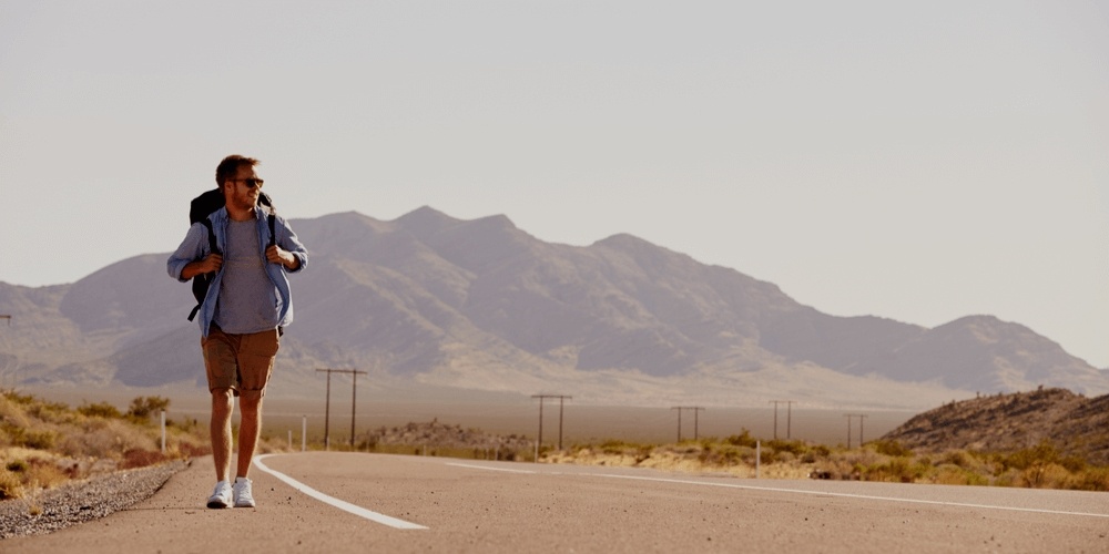 Independent man on a road