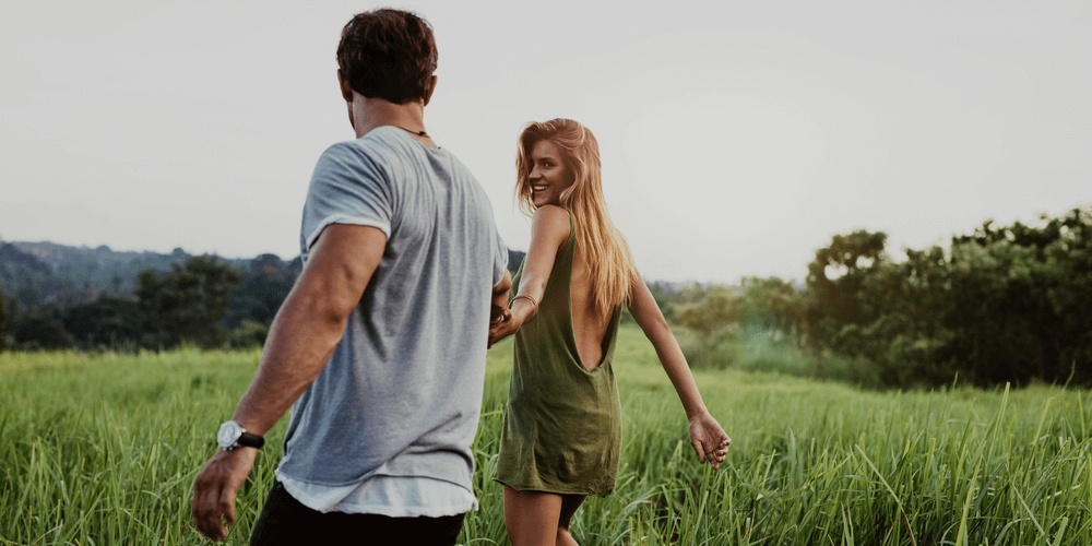 Romantic couple in a field