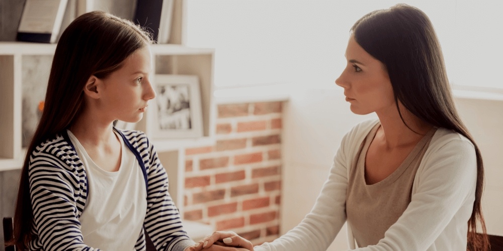 A daughter and a mother talking 