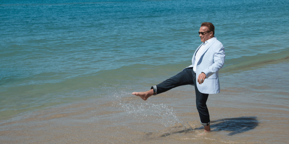 Arnold Schwarzenegger at the photocall for "Wonders of the Sea 3D" on the beach at the 70th Festival de Cannes