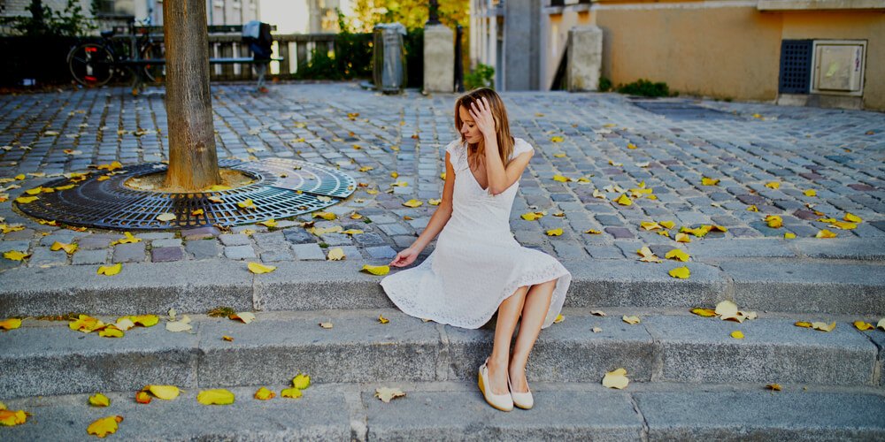 Girl in a white dress in September