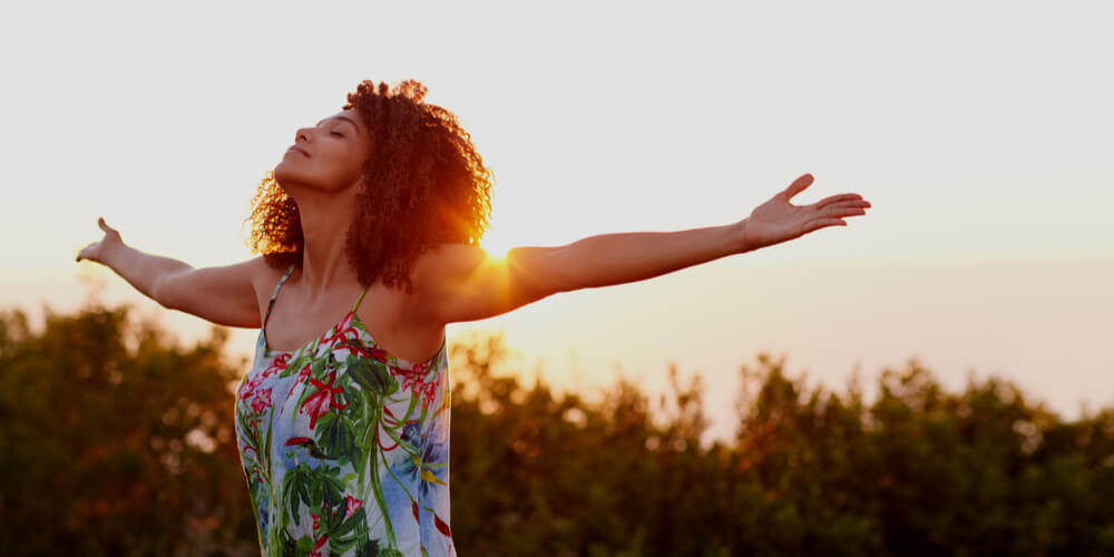 Happy dark-skinned woman