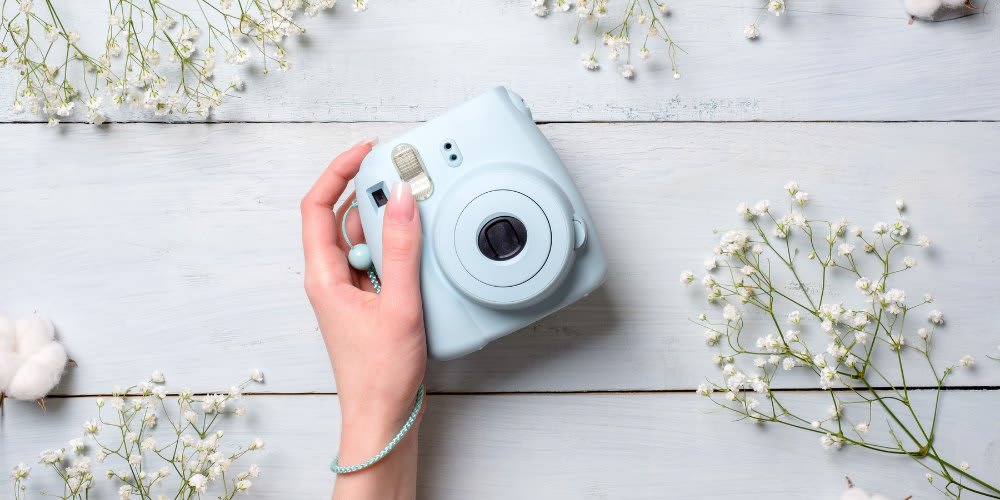 Polaroid cameras make a cute and retro gift!