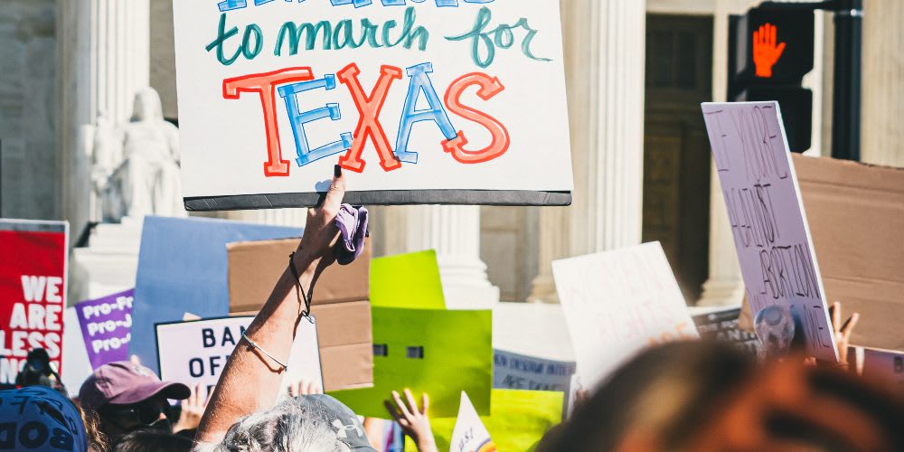 Hundreds flood the streets of Texas after the government passes an anti-abortion bill.