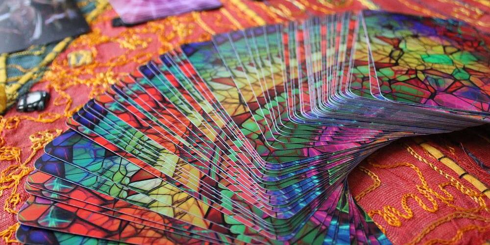 A tarot reading on an embroidered tablecloth