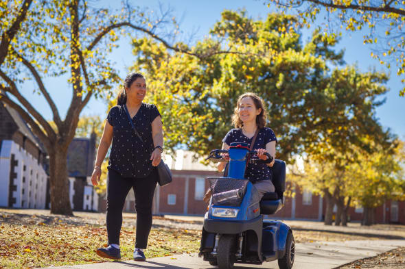 mobility equipment hire woman with mobility equipment hire