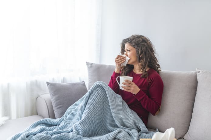 woman suffers in flu season woman suffers in flu season