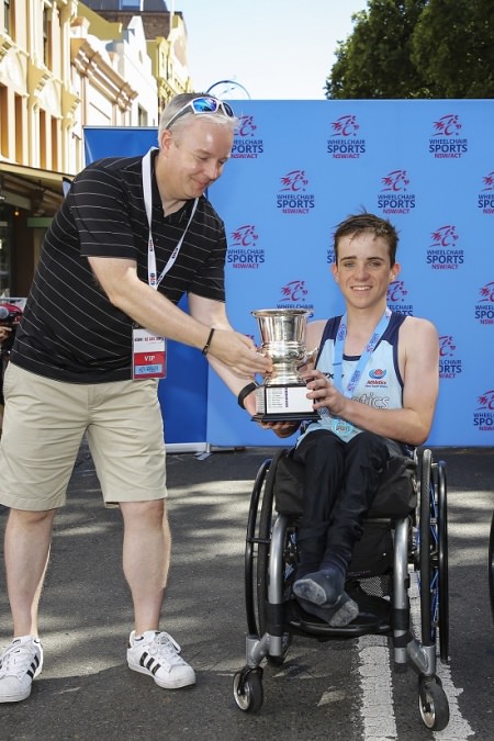 Cormac receiving trophy