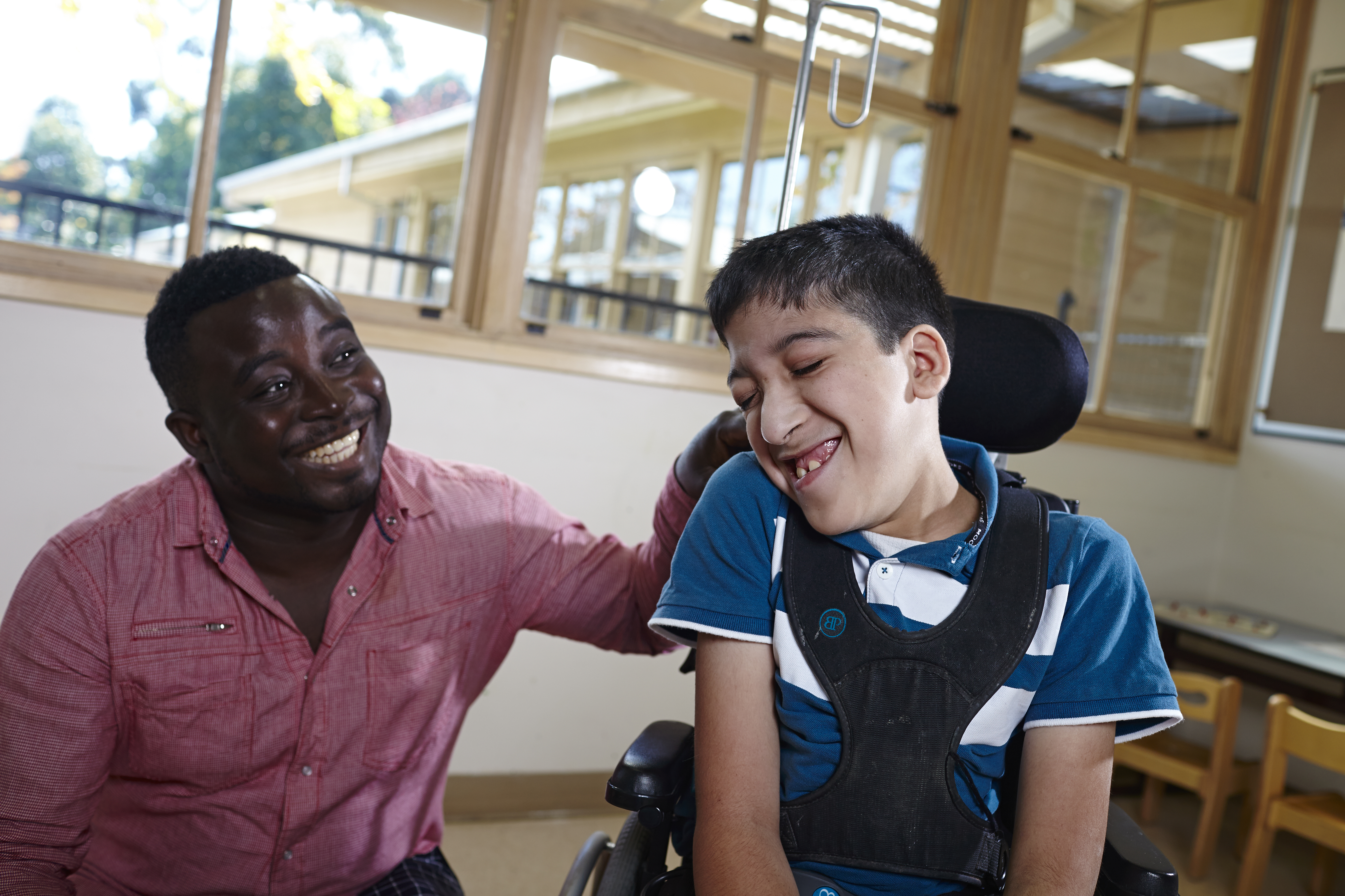 Man and boy laughing Man and boy smiling