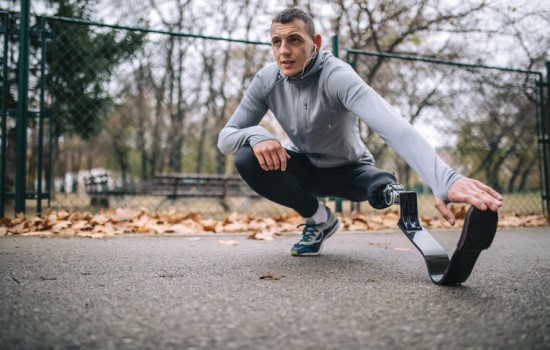 Man with prosthetic leg exercising Man with prosthetic leg exercising