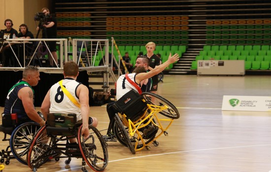 Girl playing Wheelchair Aussie Rules