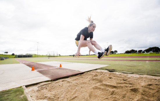 Caytlyn Sharp mid air jump