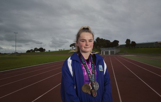 Caytlyn Sharp with medals Caytlyn Sharp with medals