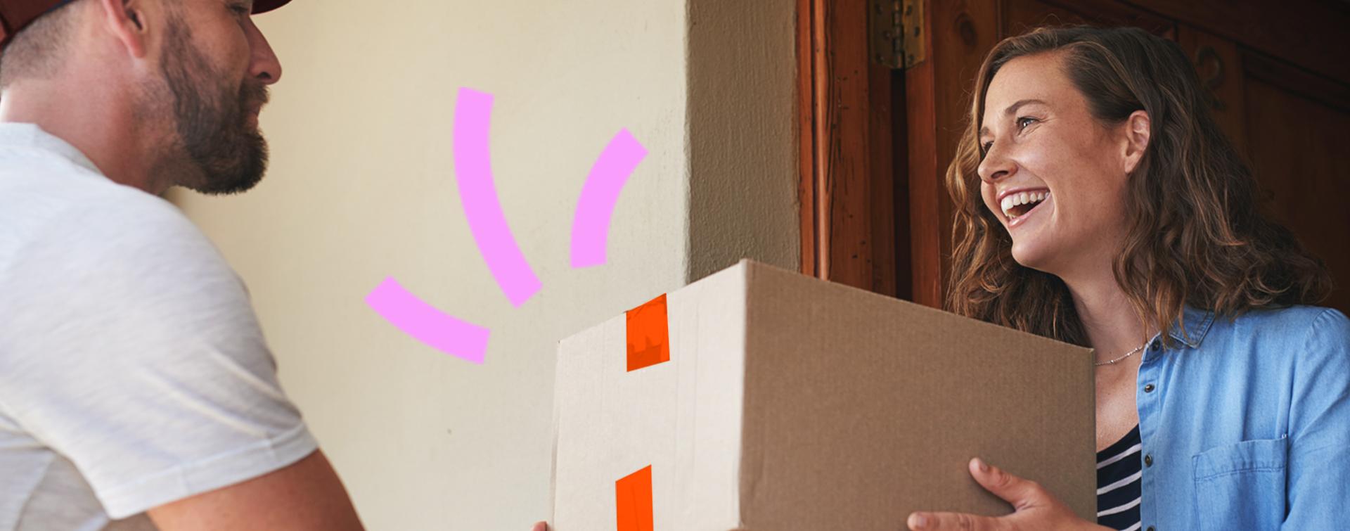 Delivery driver handing a parcel to a customer