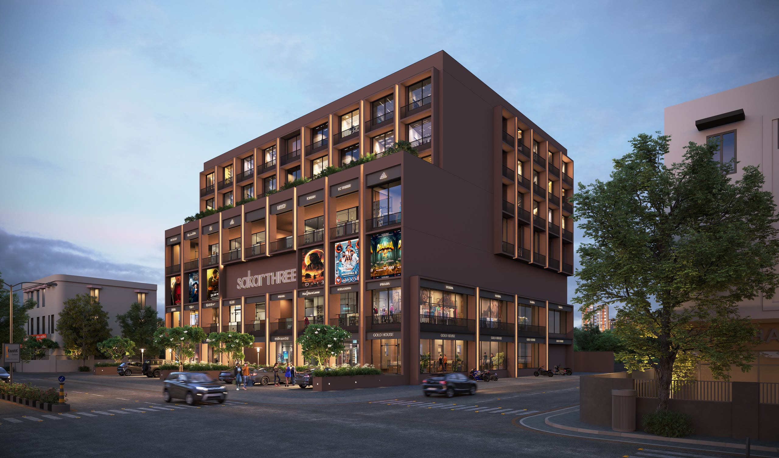 Dusk render of Sakar Three, a terracotta mixed-use building with lit shopfronts and cinema posters on HL College Road