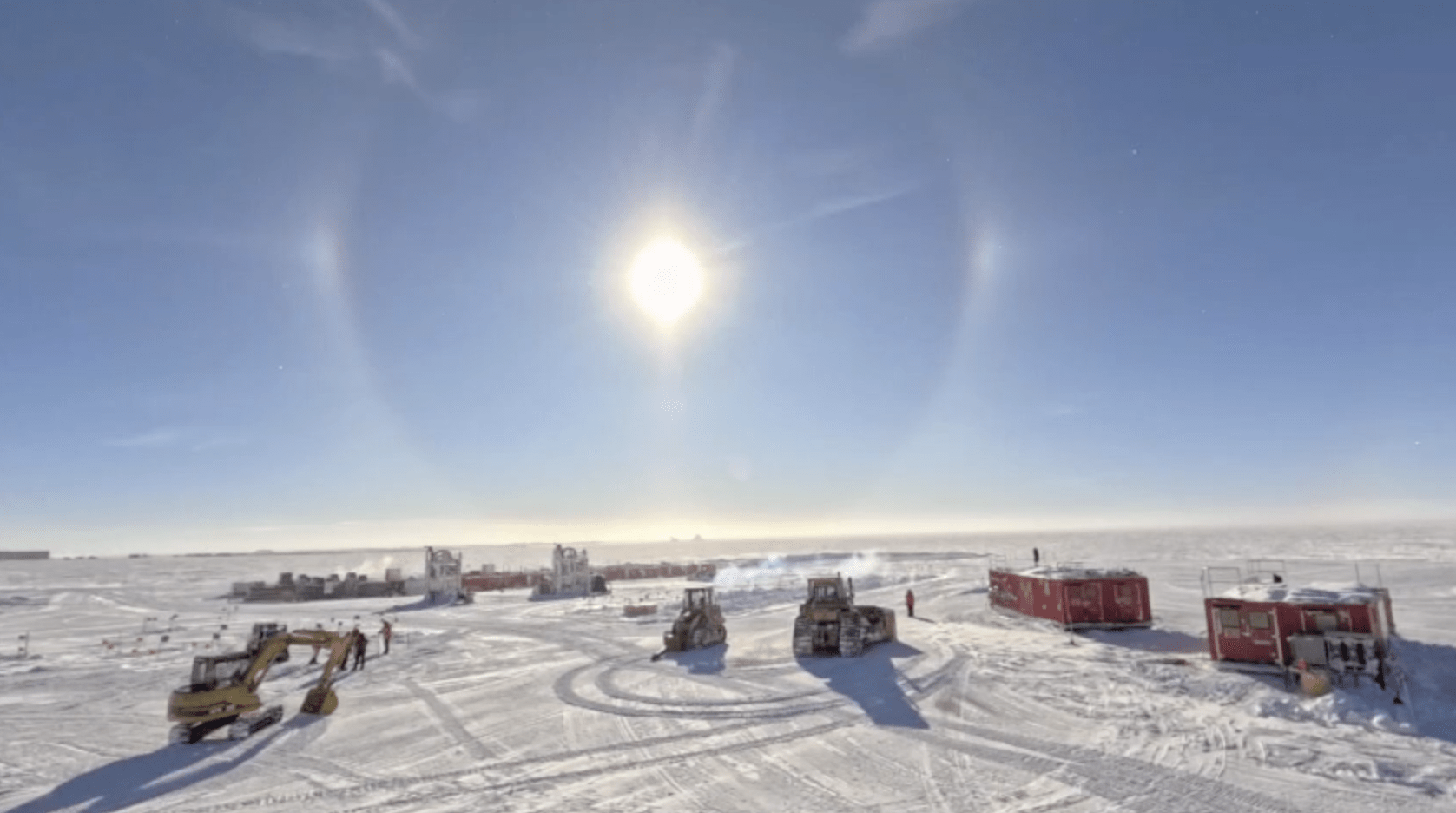A screenshot of a video showing parts of the tower operation site being moved into position at the South Pole.