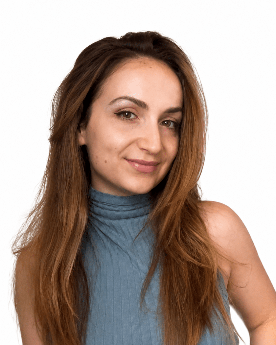 A headshot of a woman with a grey turtleneck.