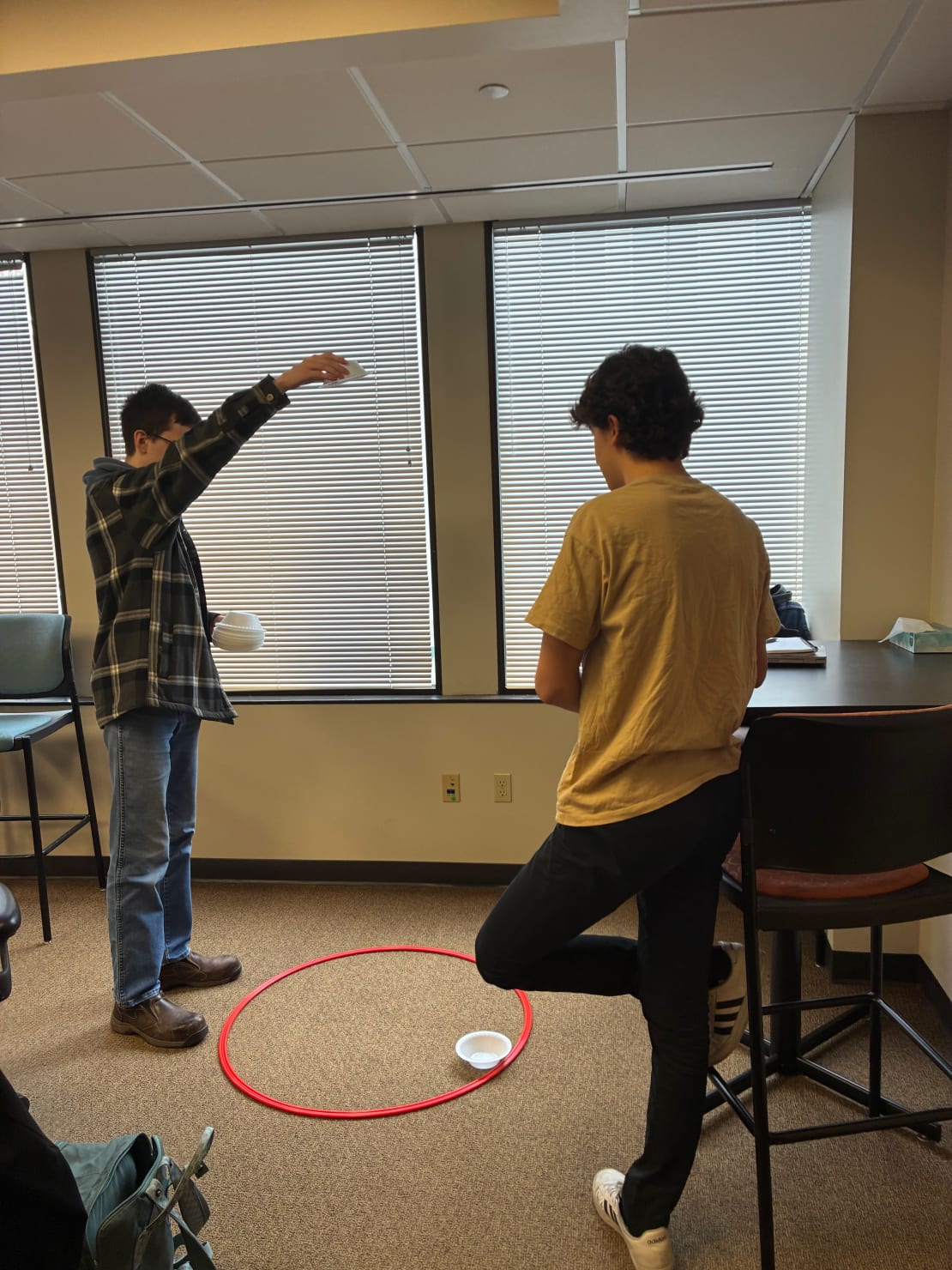 A person dropping a bowl