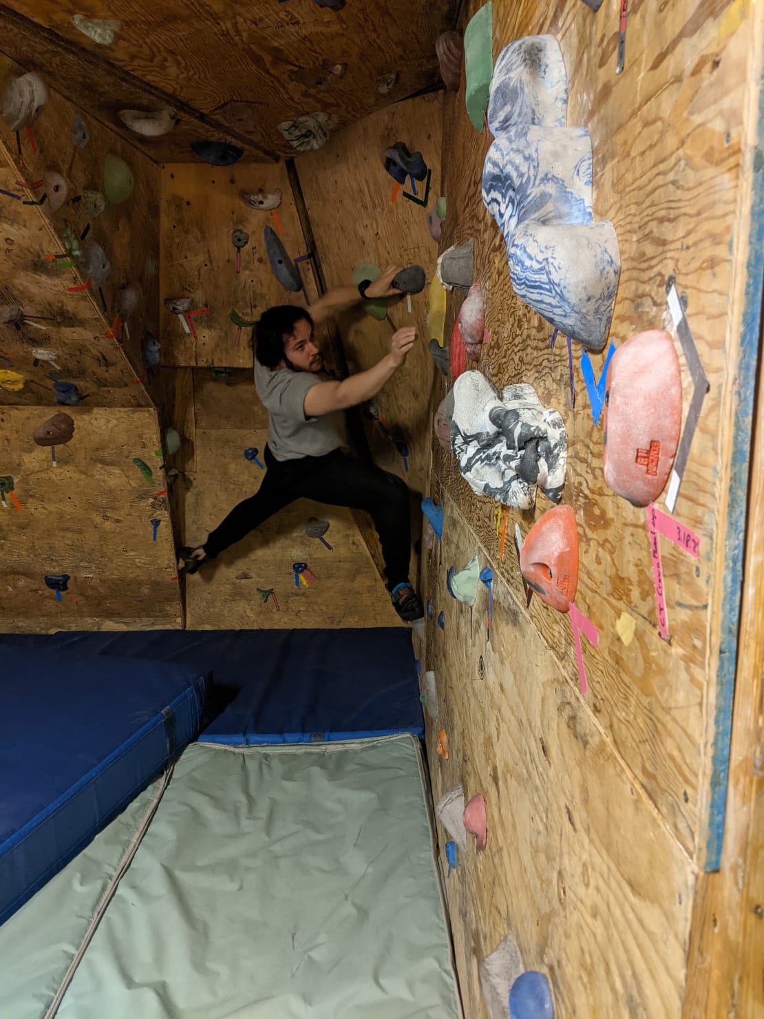 Person on rock climbing wall.