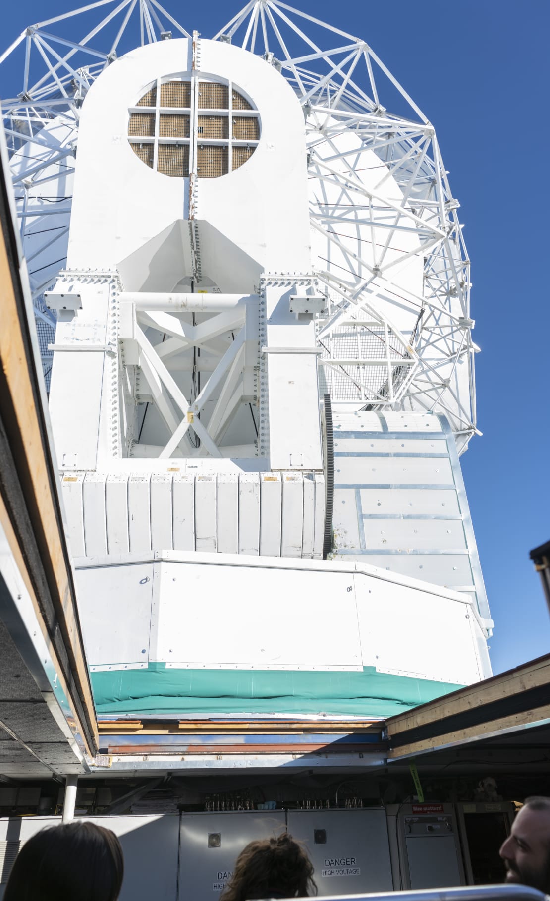 View of South Pole Telescope from below through opened roof.